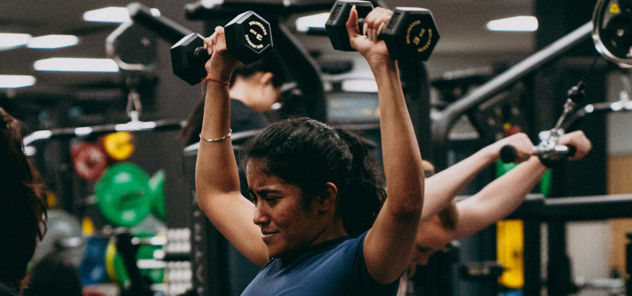GIrl lifting weights