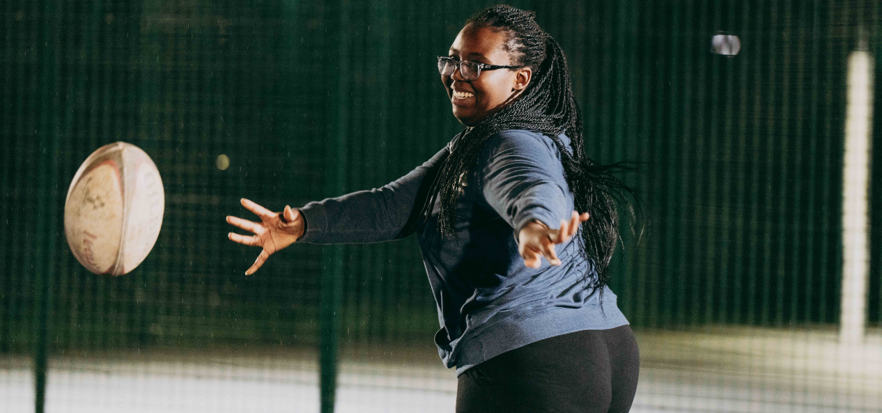 Girl playing Rugby