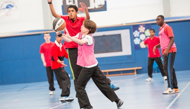 boys playing basketball