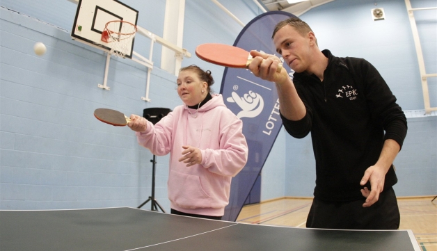 People playing table tennis