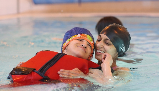 Deafblind child in swimming pool
