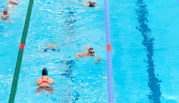 People swimming in swimming pool