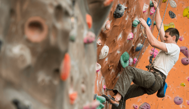 Volunteering climbing action shot