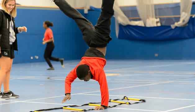 Walking handstand in the gym
