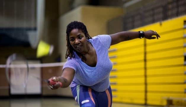 Woman playing badminton