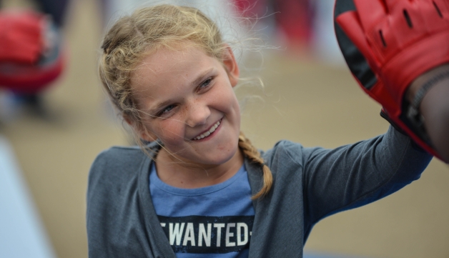 girl training with a boxing coach