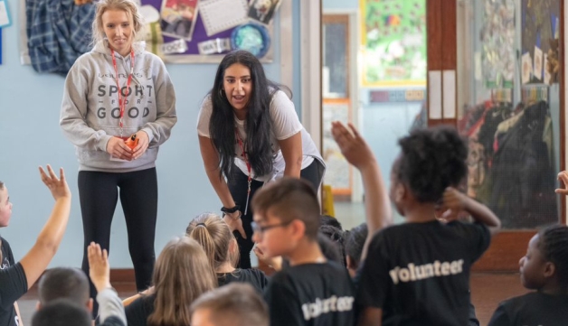 Volunteers from the Laureus Sport for Good Foundation put on a physical activity session in a Nottingham primary school hall