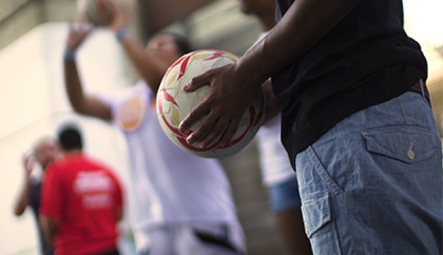 A basketball club playing their sport