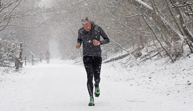 A man running in the snow