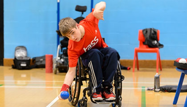 A member of the Talented Athlete Scholarship Scheme plays Boccia
