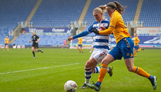 An FA Women's Super League game between Reading and Everton, played in front of empty stands.