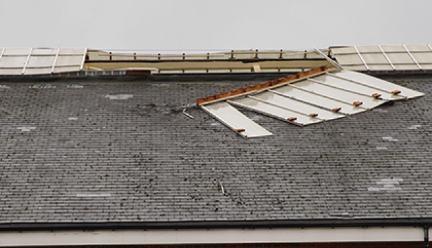 Part of the roof blown off a sports facility