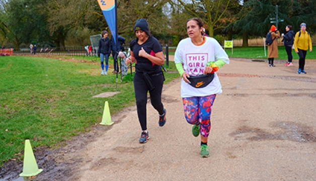 Two women, one wearing a This Girl Can t-shirt, take part in the first International Women's Day This Girl Can parkrun