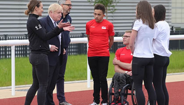 Former heptathlete Kelly Sotherton, Prime Minister Boris Johnson and Sport England Chief Executive speak to young athletes at the Alexander Stadium, at an occasion to mark Sport England's £6.5m investment into national governing bodies of sport ahead of the Birmingham 2022 Commonwealth Games