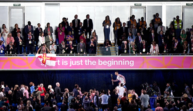 'Sport is just the beginning' is displayed on a board at the opening ceremony of the Birmingham 2022 Commonwealth Games as Max Whitlock delivers the Queen's Baton into the Alexander Stadium