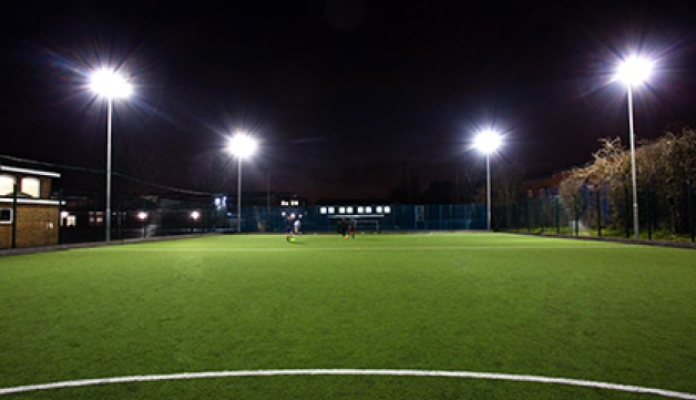 Floodlights on a 4G community football pitch