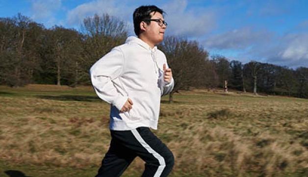 A man runs in a park