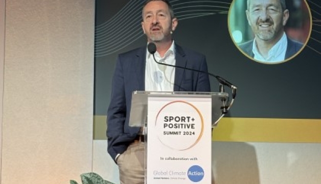 Chris Boardman speaks at a lectern during the Sport Positive summit.