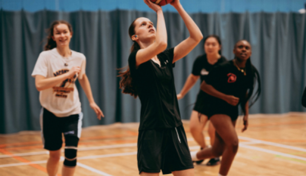 Girls playing basketball