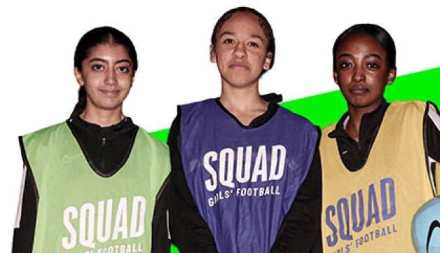 Three girls stand side-by-side wearing bibs with the words "SQUAD GIRLS' FOOTBALL" on them. One of the girls is also carrying a football under her left arm.