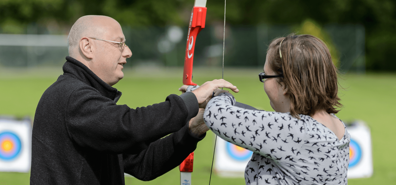 Coaching archery lesson