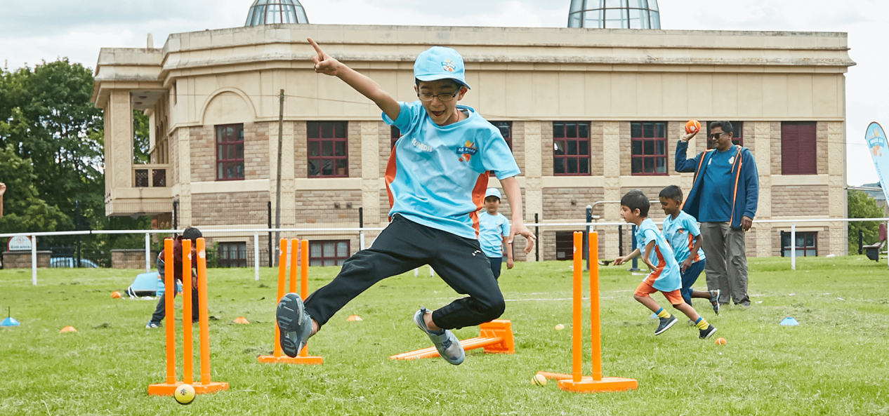 Boy jumping on pitch