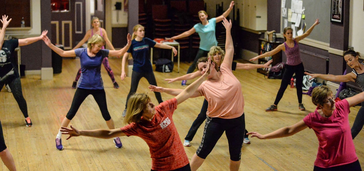 A group of women in a health and exercise class.