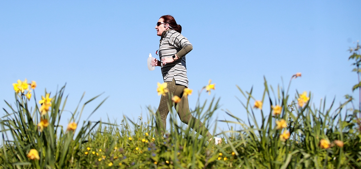 A runner enjoys a run in park
