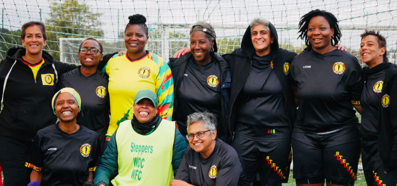 Steppers Women Of Colour Walking Football Club take group portrait