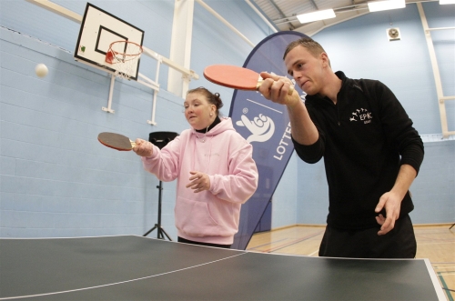 People playing table tennis