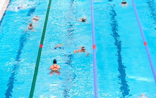 Lane swimming at a public indoor swimming pool.