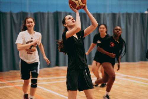 Girls playing basketball