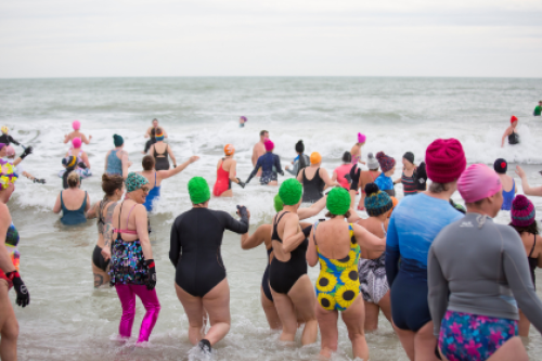 Group of women swimming in sea
