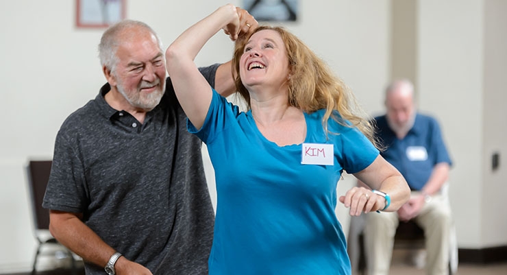 A man and a woman dancing together.